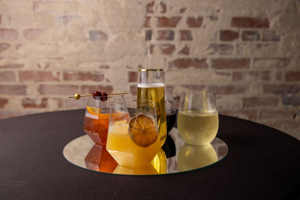 Houston wedding cocktails • Signature drinks for weddings • Brandt 1910 wedding venue • Simple wedding cocktails • His and hers wedding drinks • Wedding bar ideas Houston • Fulshear wedding venue • Classic cocktails for weddings • Southern wedding cocktails • Texas wedding inspiration